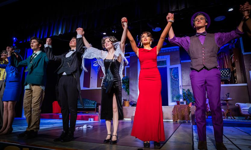 Students perform Clue onstage